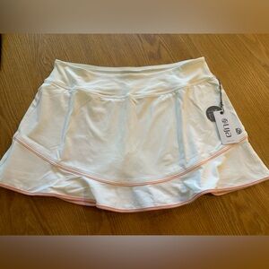 NWT Lija white tennis skirt with pink piping. Size L